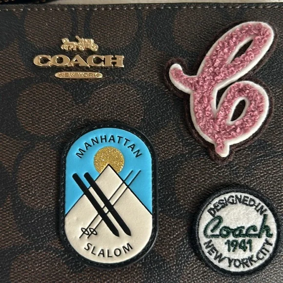 NWT Coach large wristlet with appliqués - Picture 3 of 5